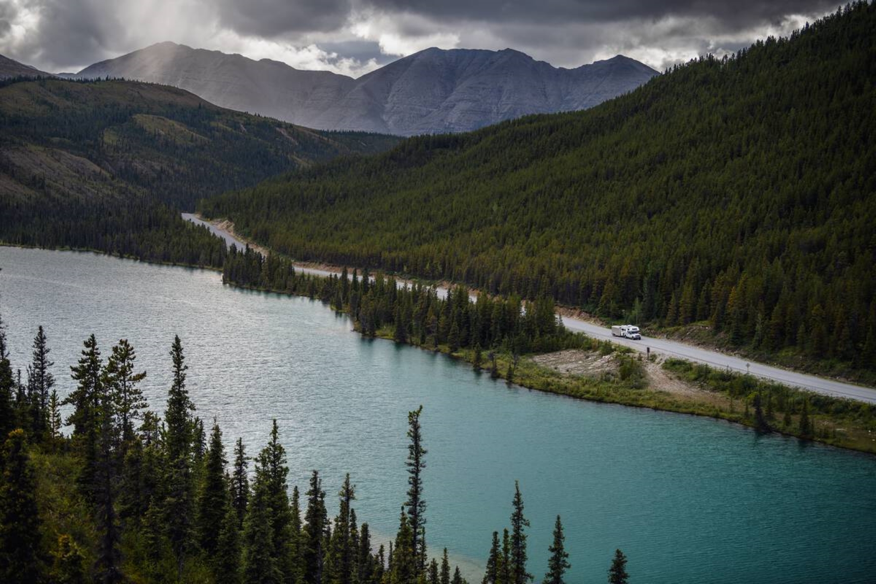 The Alaska Highway along Summit Lake in Stone Mountain Provincial Park. Photo credit: Destination BC