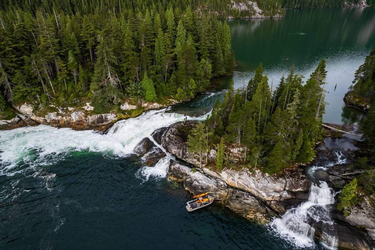 <p>Aerial view of Jesse Falls Protected Area where water from Jesse Lake drops 10 metres into the ocean along British Columbiaโs Douglas Channel. Courtesy of Destination BC</p>