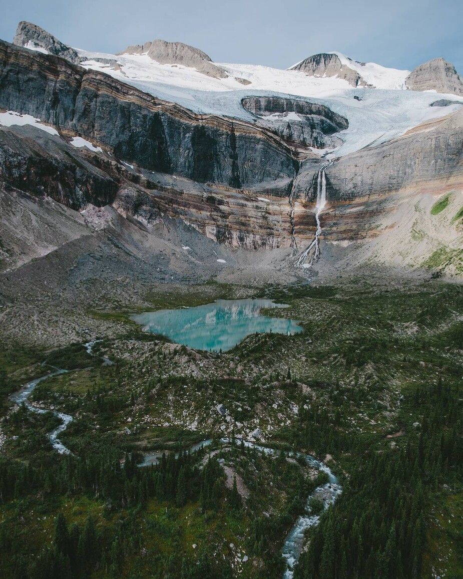 Mount Bulley and the Bulley Glacier with Bulley Glacier Falls cascading into a glacial tarn in Monkman Park. Photo credit Destination BC