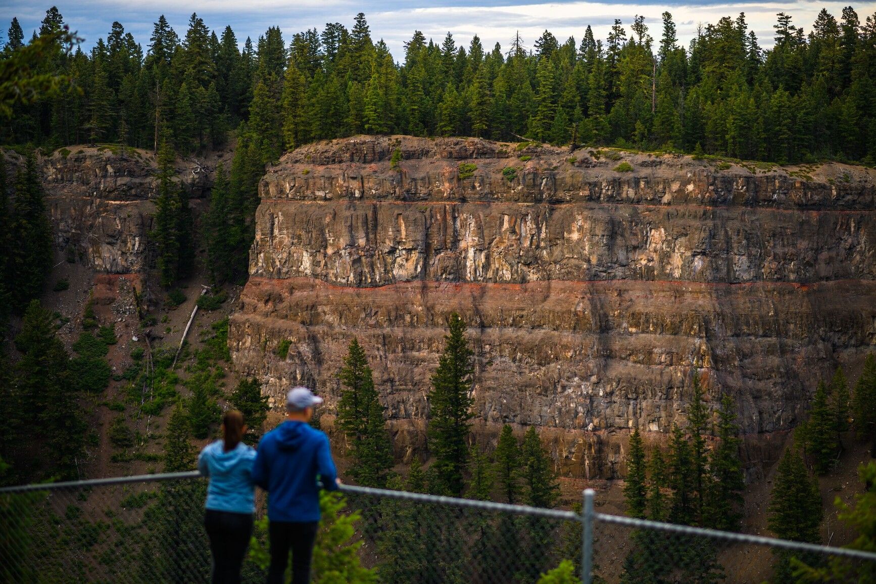 From a lookout, park visitors view the canyon at Chasm Park.