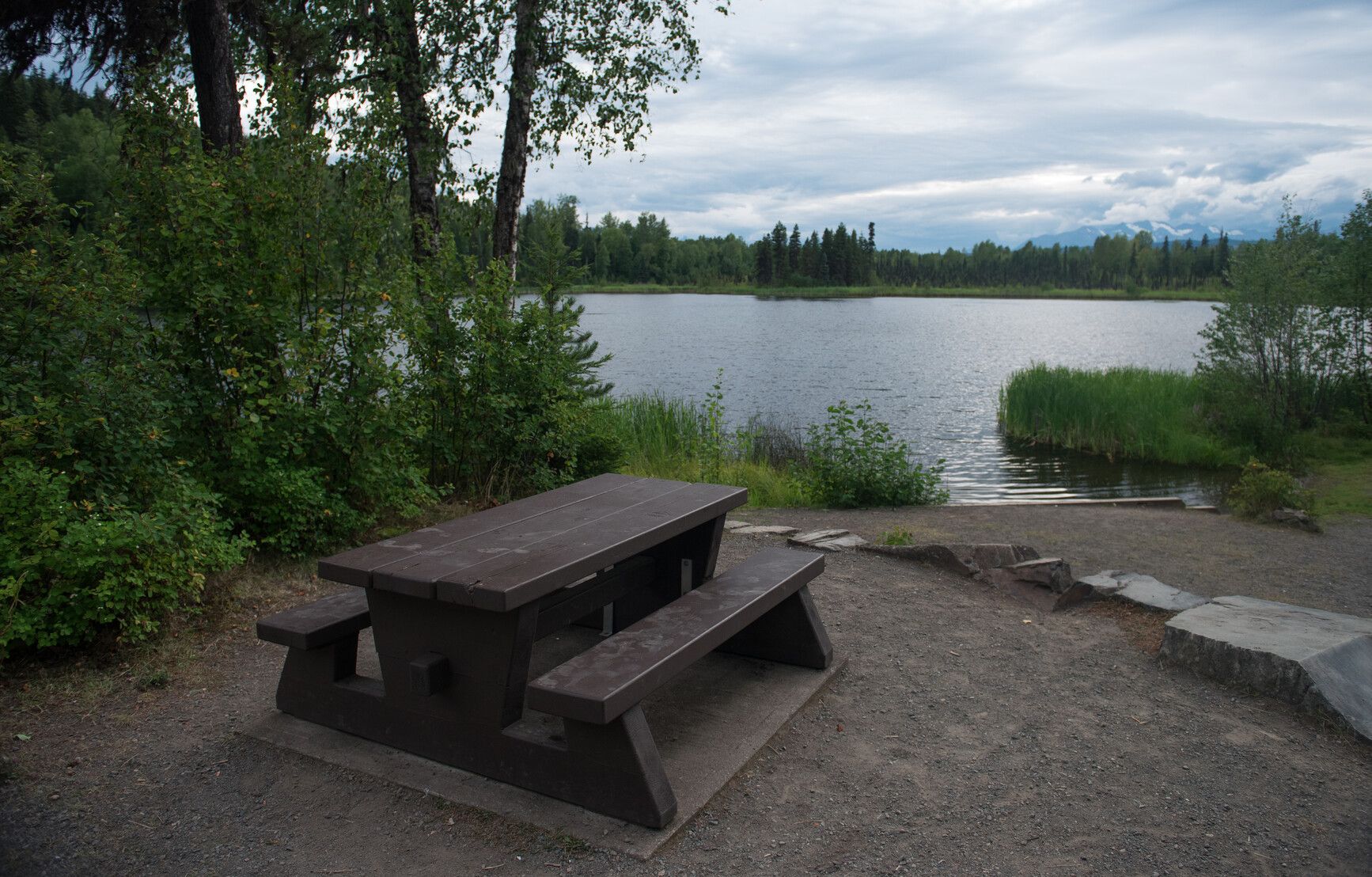 A picnic table in the day-use area of Seeley Lake Park.