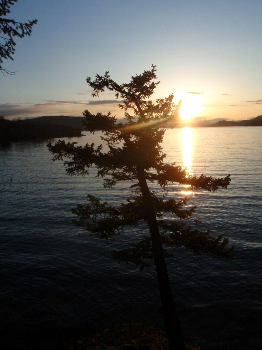 A fall sunrise from the shore of Babine Lake Marine Park at Pinkut Creek Site.