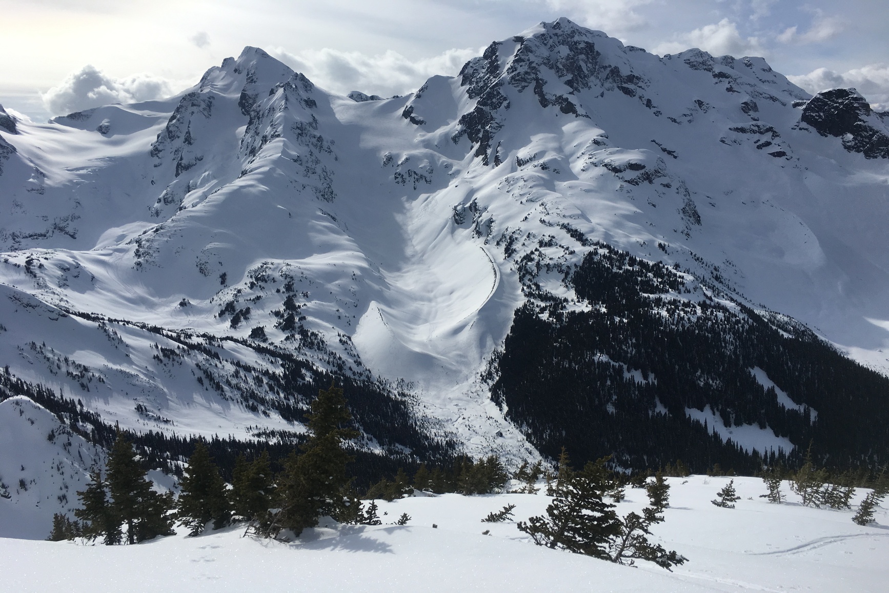 Distant view of a popular winter ski touring zone within the Cerise Creek Conservancy