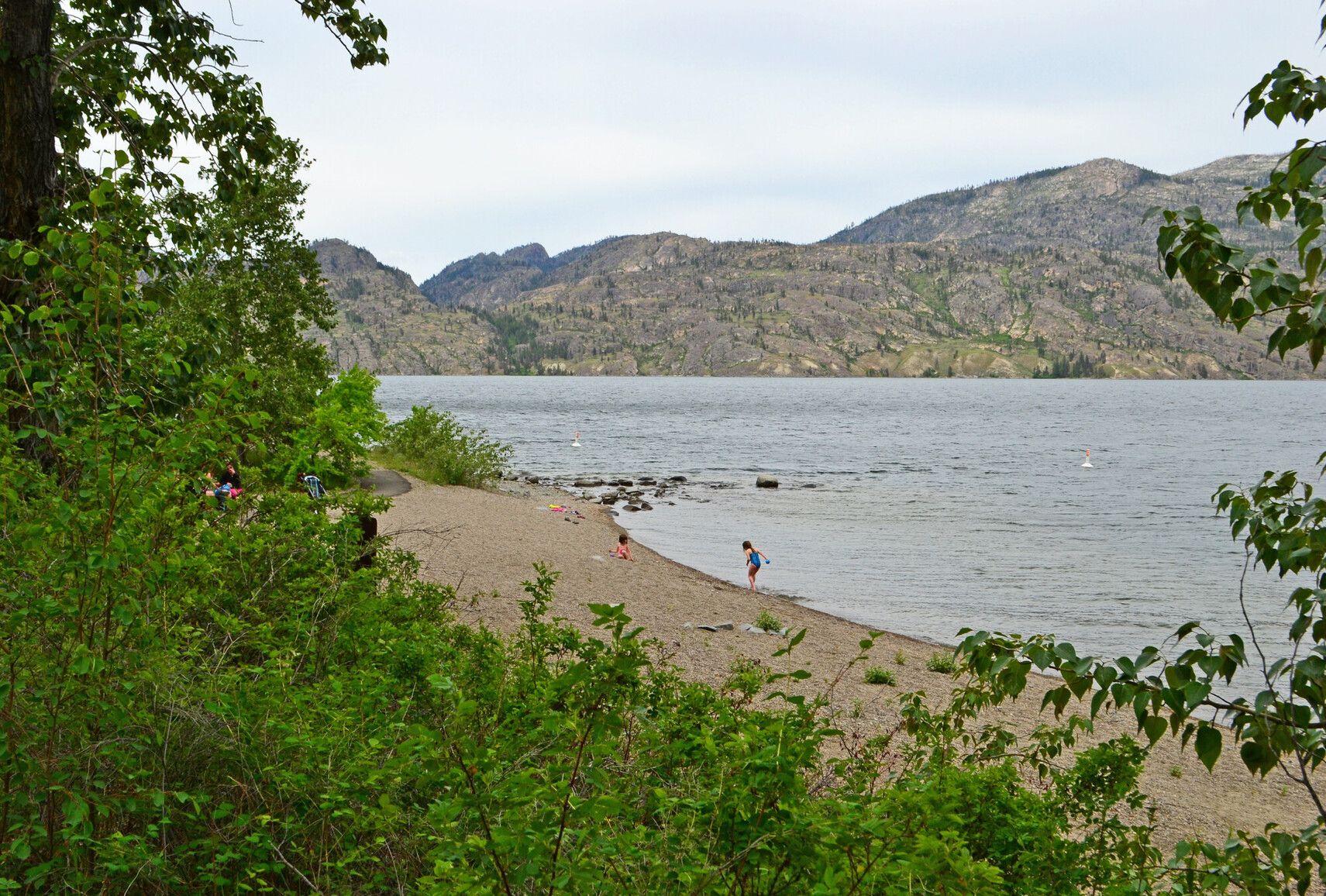 Enjoy a perfect family day at Okanagan Lake Park. Relax by the beach and cool down in the lake on hot summer days.