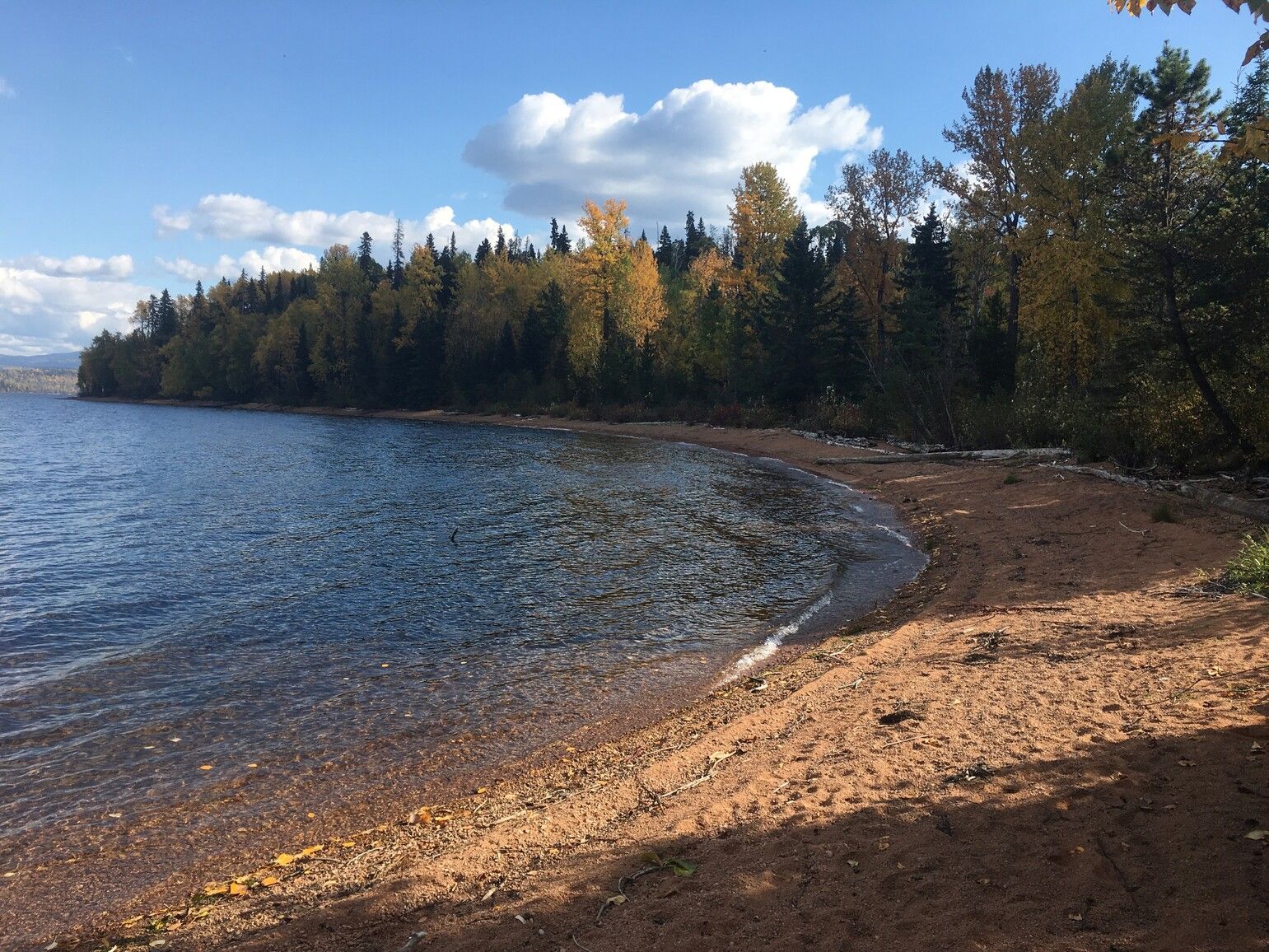 A beach on the shore of Babine Lake accessible by the Red Bluff Loop Trail.