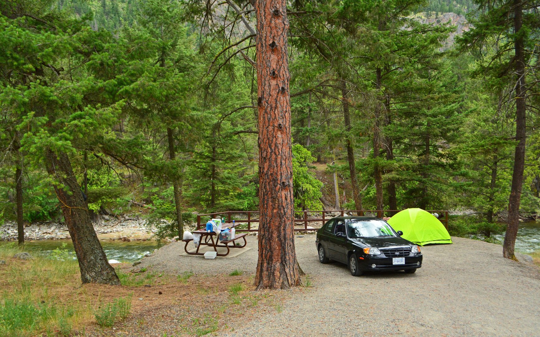 A riverside campsite in Stemwinder Park beside the Similkameen River, ideal for enjoying scenic river views and soothing sounds.