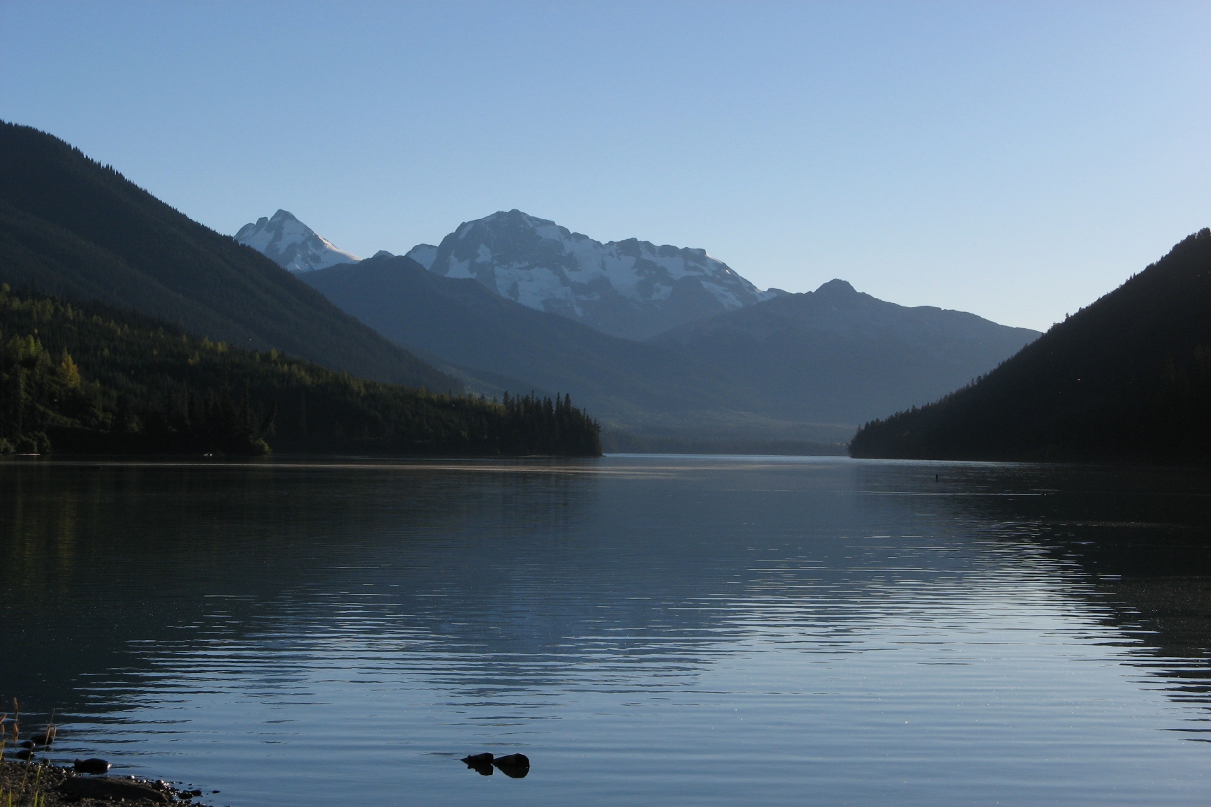 View of Duffey Lake with mountains in the background