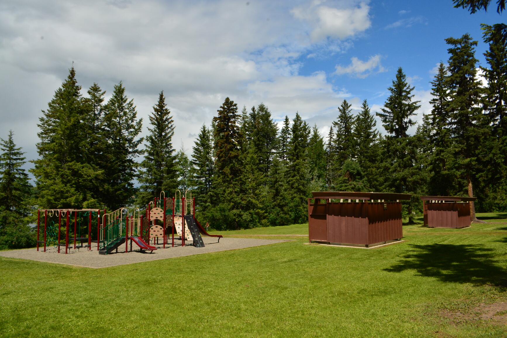 Playground and washroom facilities at Ten Mile Lake Park.